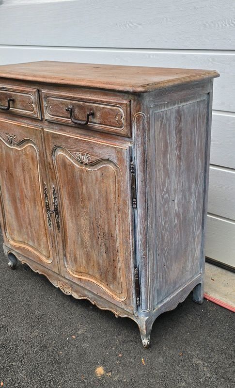 Antique chest of drawers with a cerused and patinated finish.
