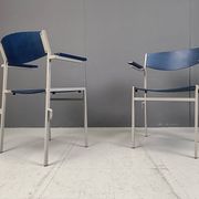 Minimalist metal and plywood stackable armchairs by Gijs Van Der Sluis
