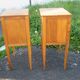 Pair of walnut bedside tables in Louis XVI style with brass inlay.