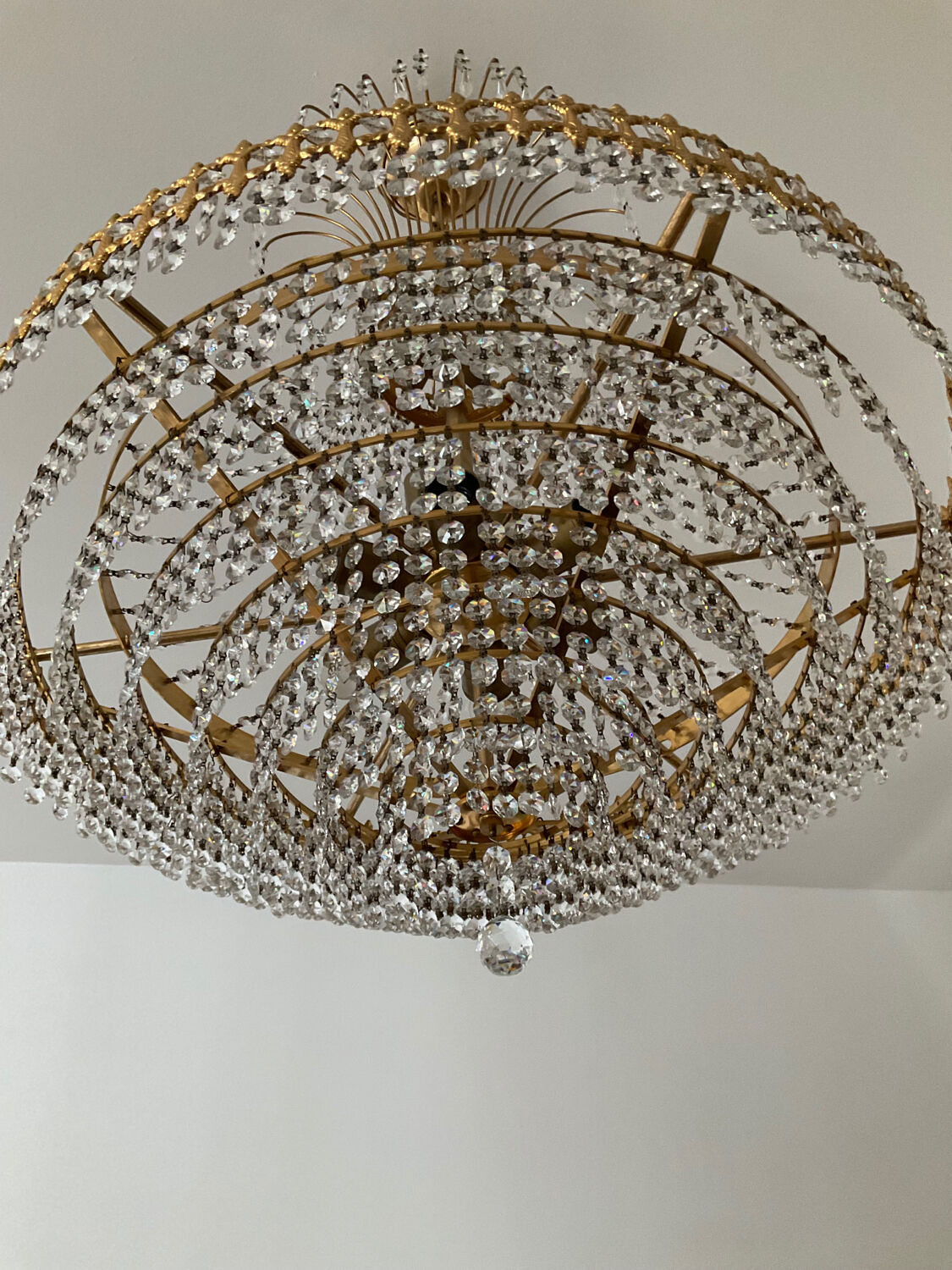 Brass chandelier and crystal tassel waterfall