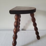 Brutalist stool turned wooden feet