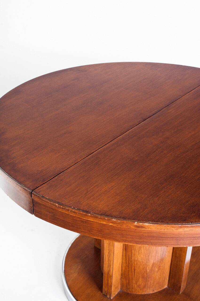 Dining table with a central extension. Vintage. Art Deco style. Varnished wood. France, 1960s.