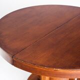 Table à manger avec une rallonge centrale. Vintage. Style Art Déco. Bois vernis. France, années 60.