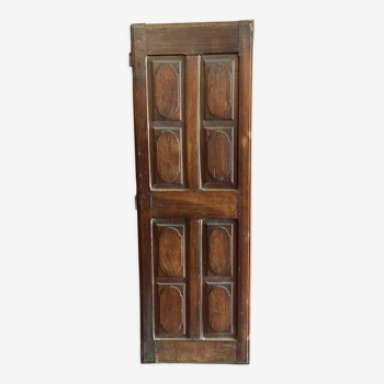 France old 18th century walnut closet door. Composed of 8 finely carved panels.