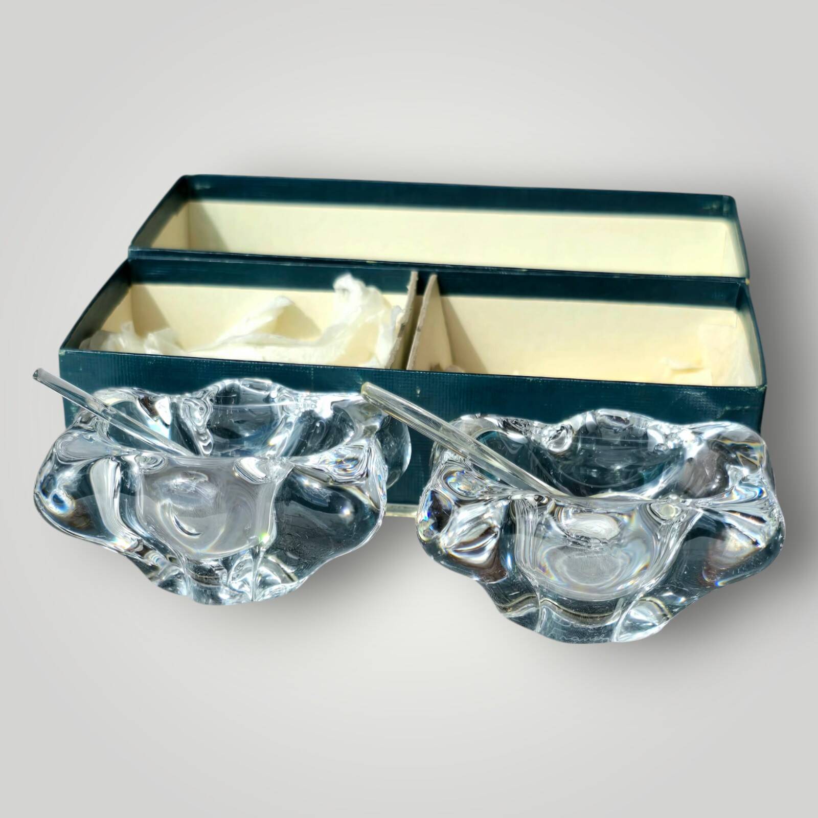 Pair of crystal salt shakers and glass spoons signed Daum Cristal