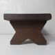 Old small wooden bench step in solid oak
