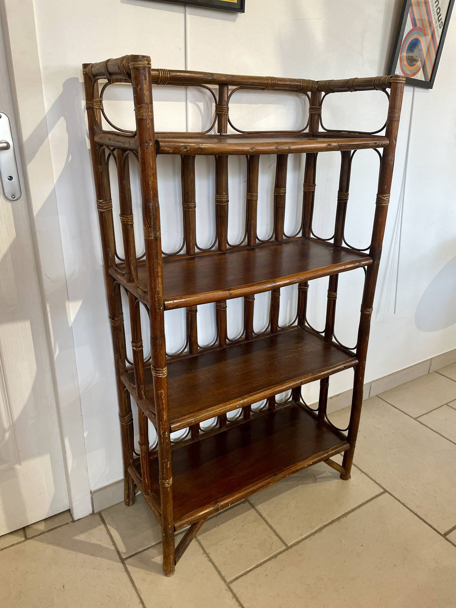 Shelf on rattan and bamboo legs from the 70s