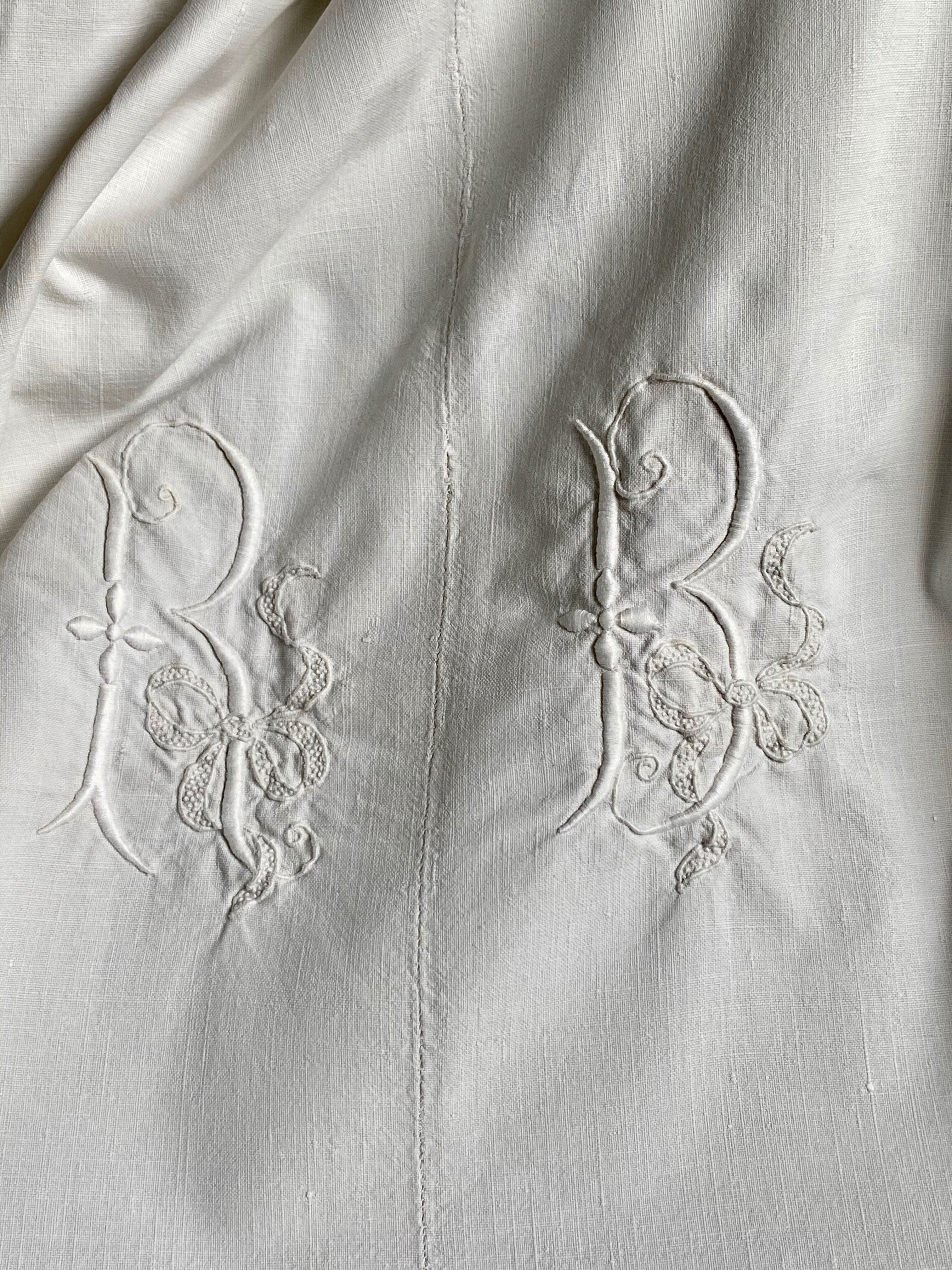 Old sheet with monogram