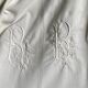 Old sheet with monogram