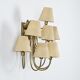 Wall sconce with nine arms in brass, France, circa 1950.
