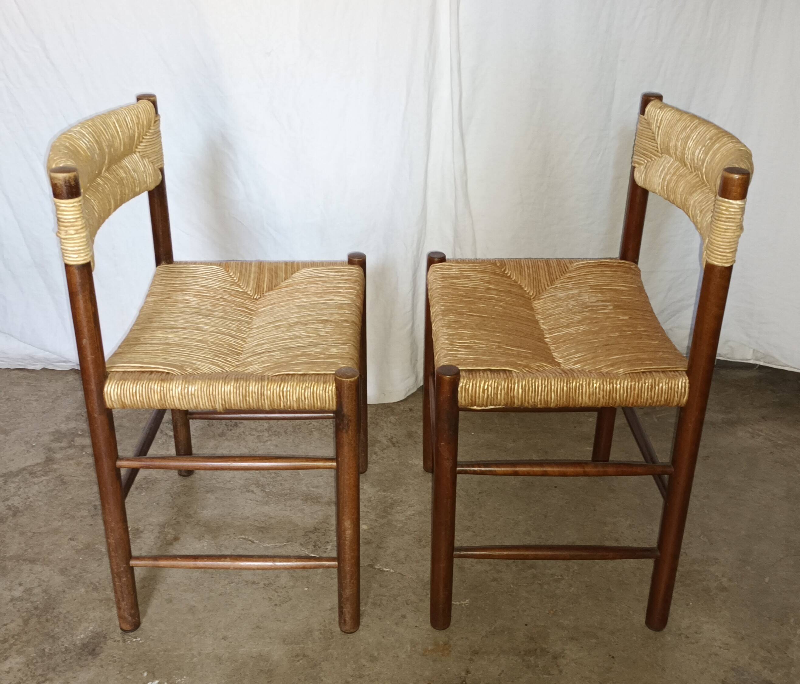 Pair of "Dordogne" chairs by Charlotte Perriand from the 1950s.