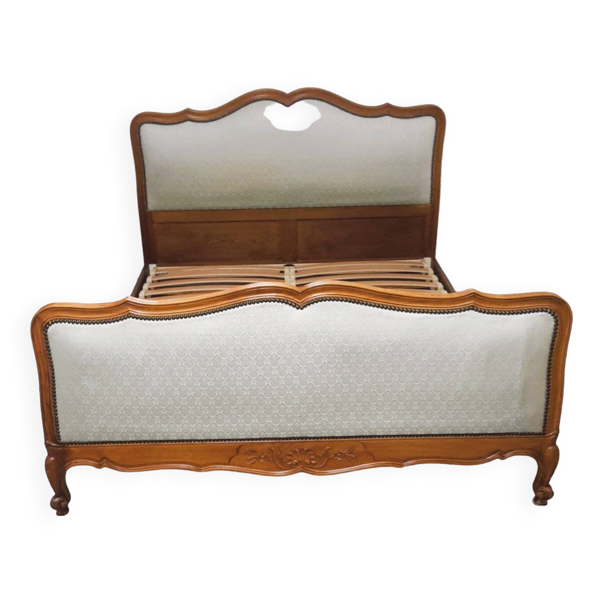 Cabinetmaker's bed frame and matching upholstered bedspread