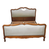 Cabinetmaker's bed frame and matching upholstered bedspread