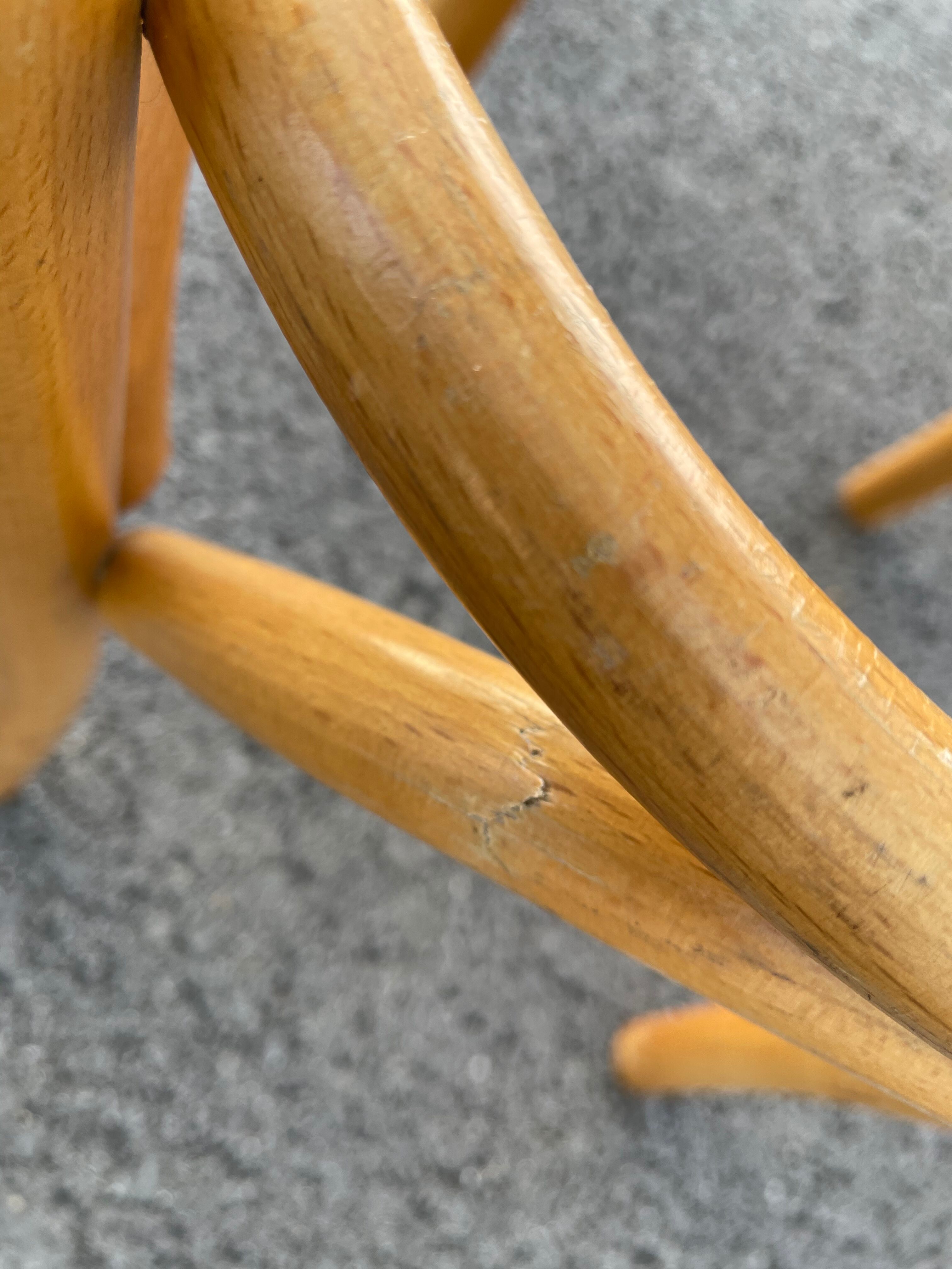 Curved wooden bar stool
