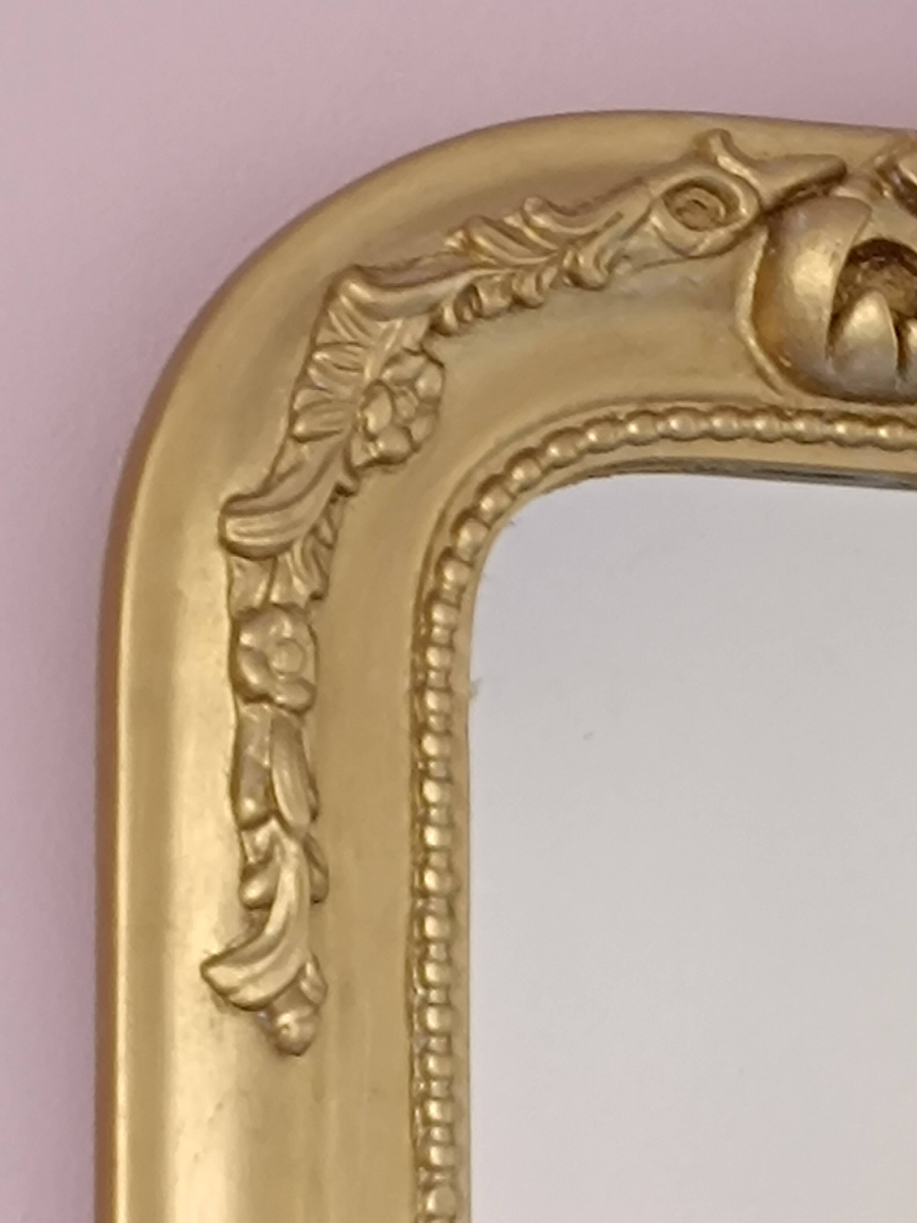 Gilded mirror with a Louis Philippe style pediment