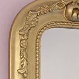 Gilded mirror with a Louis Philippe style pediment