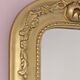 Miroir doré a fronton style Louis Philippe