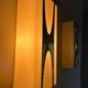 Pair of Loewy wall lights for Hilton, brass and Perspex, France 1965