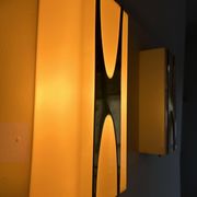 Pair of Loewy wall lights for Hilton, brass and Perspex, France 1965