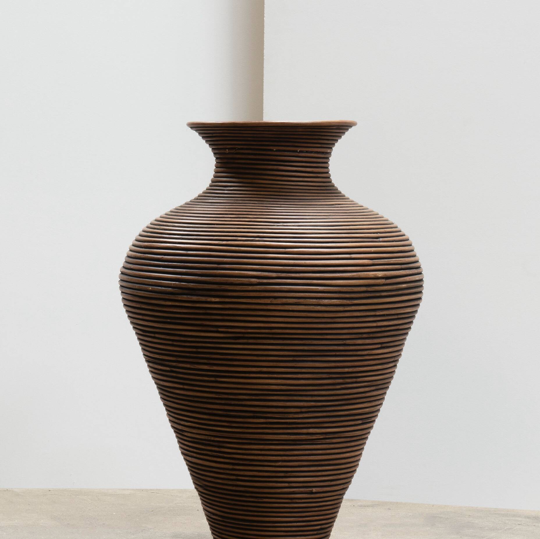 Curved rattan floor vase, Italy 1970.