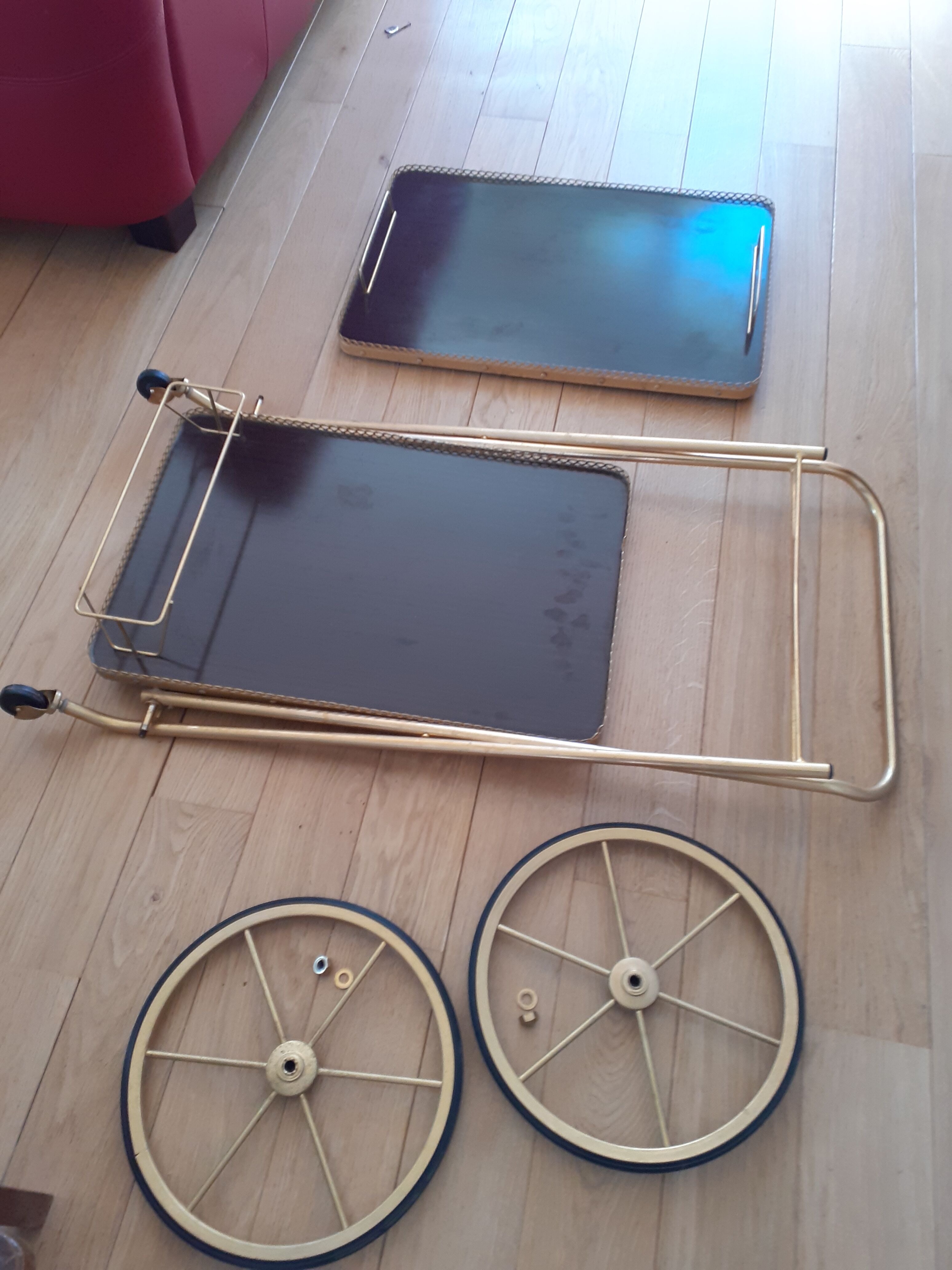 Rolling service in formica and gilded metal