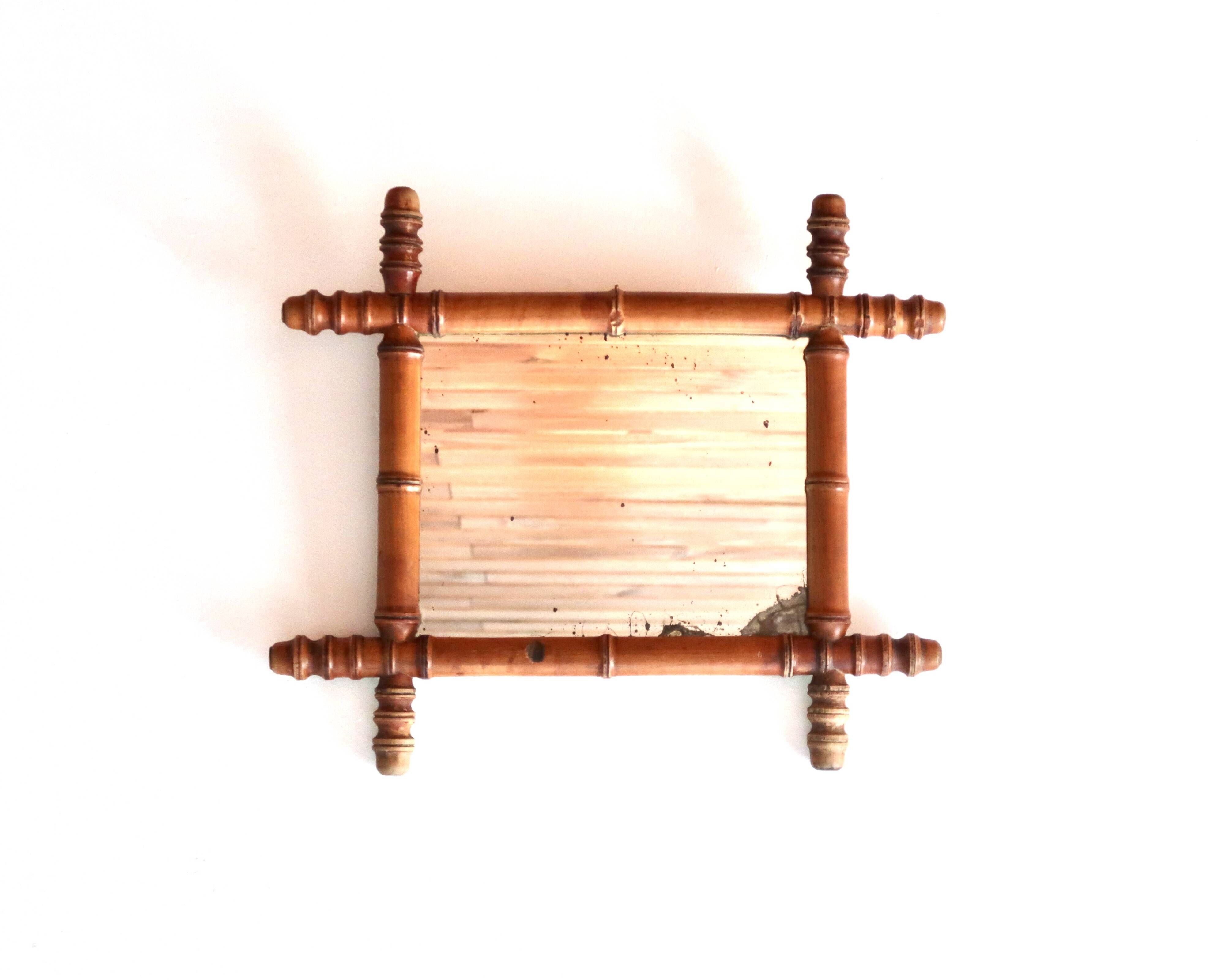 Small wall mirror in turned wood in a faux bamboo style, 1930s.