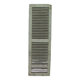 Old wooden shutter with perforations.