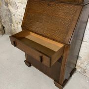 Oak display secretary cabinet with drop-down front, two sections.