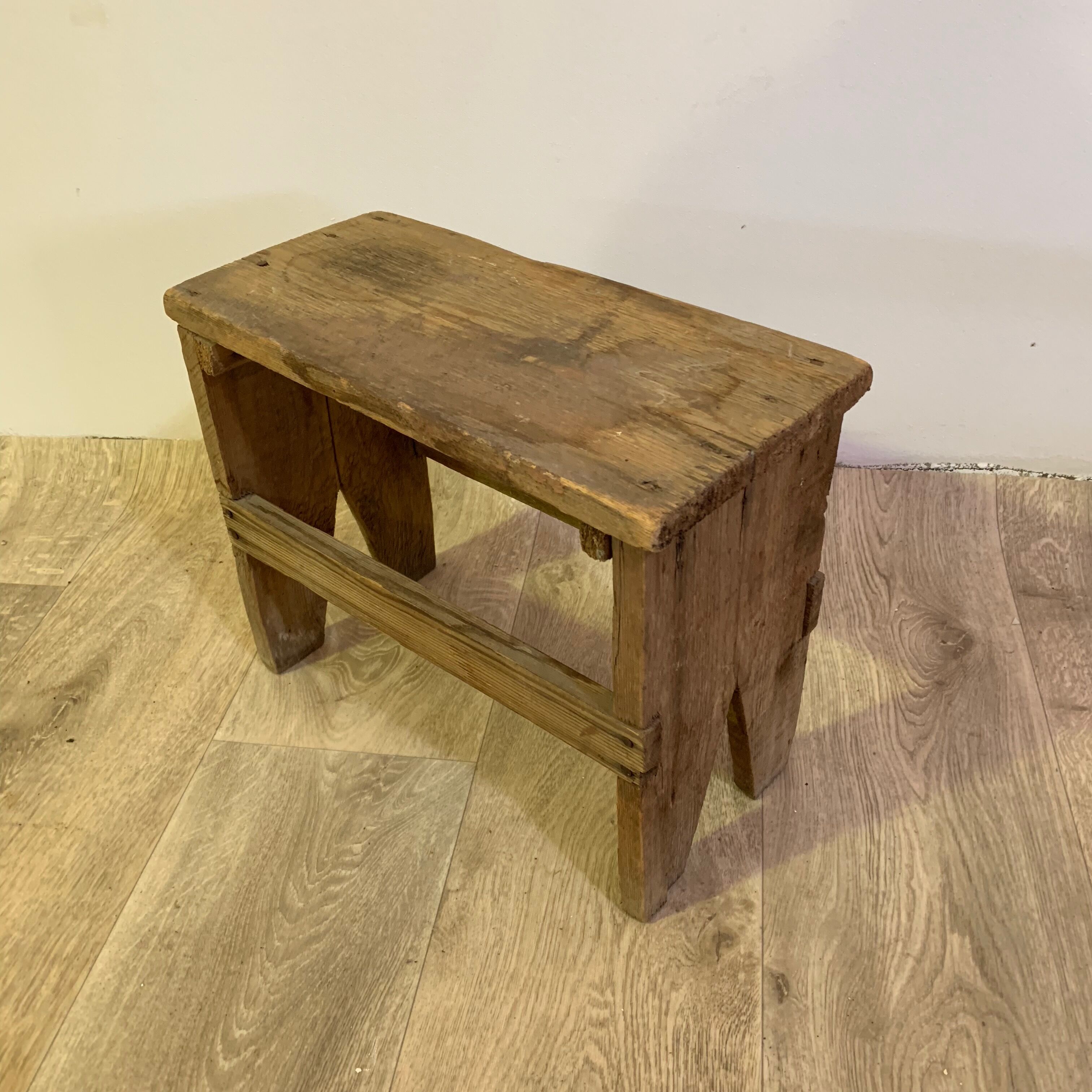 Old wooden foot foot stool
