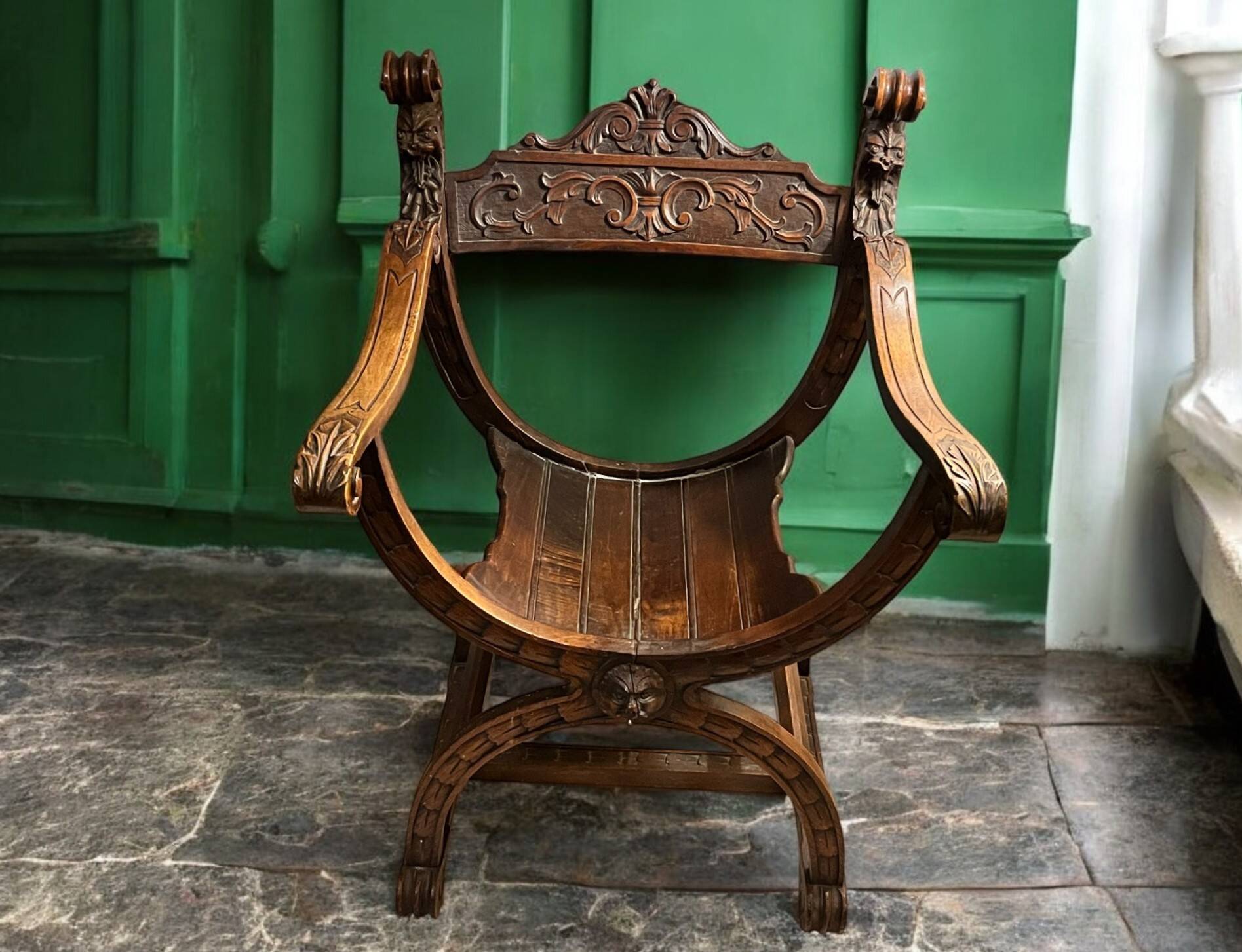 Armchair called Dagobert in carved wood circa 1900