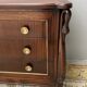 Empire style chest of drawers with gooseneck