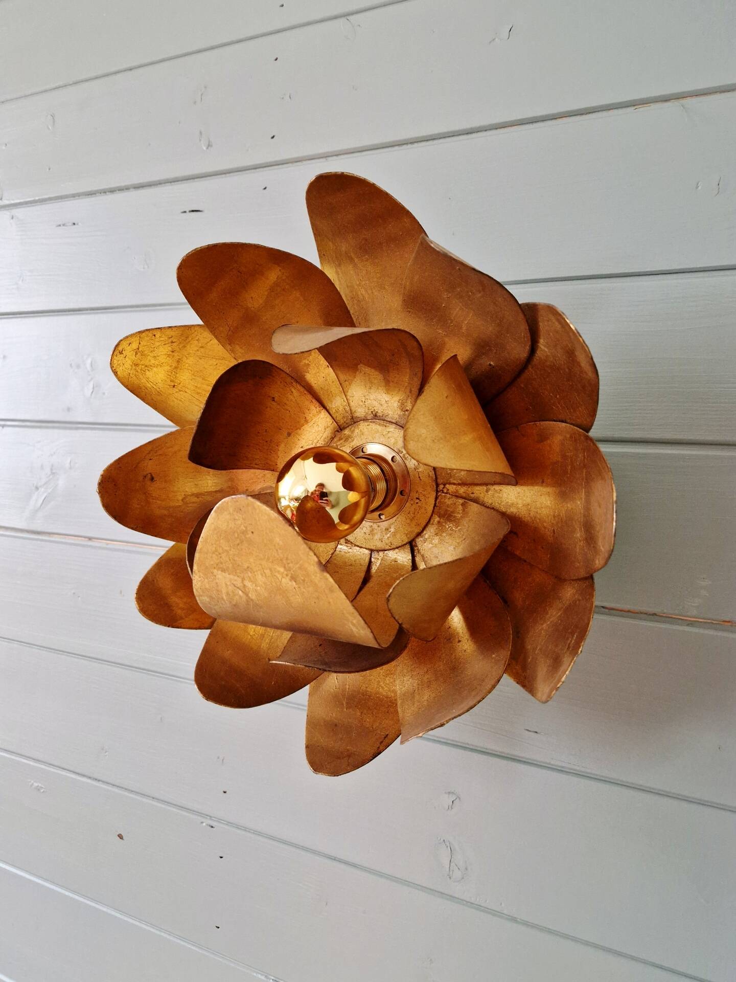 Gold metal floral wall light, 1960-70.