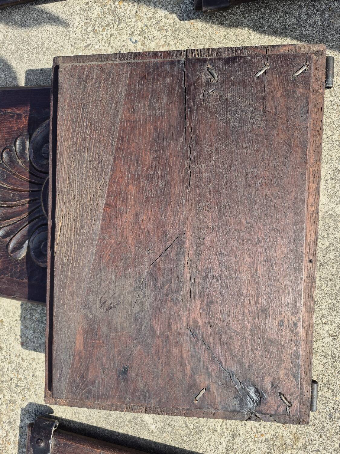antique cabinet with carvings and wrought iron fittings rural