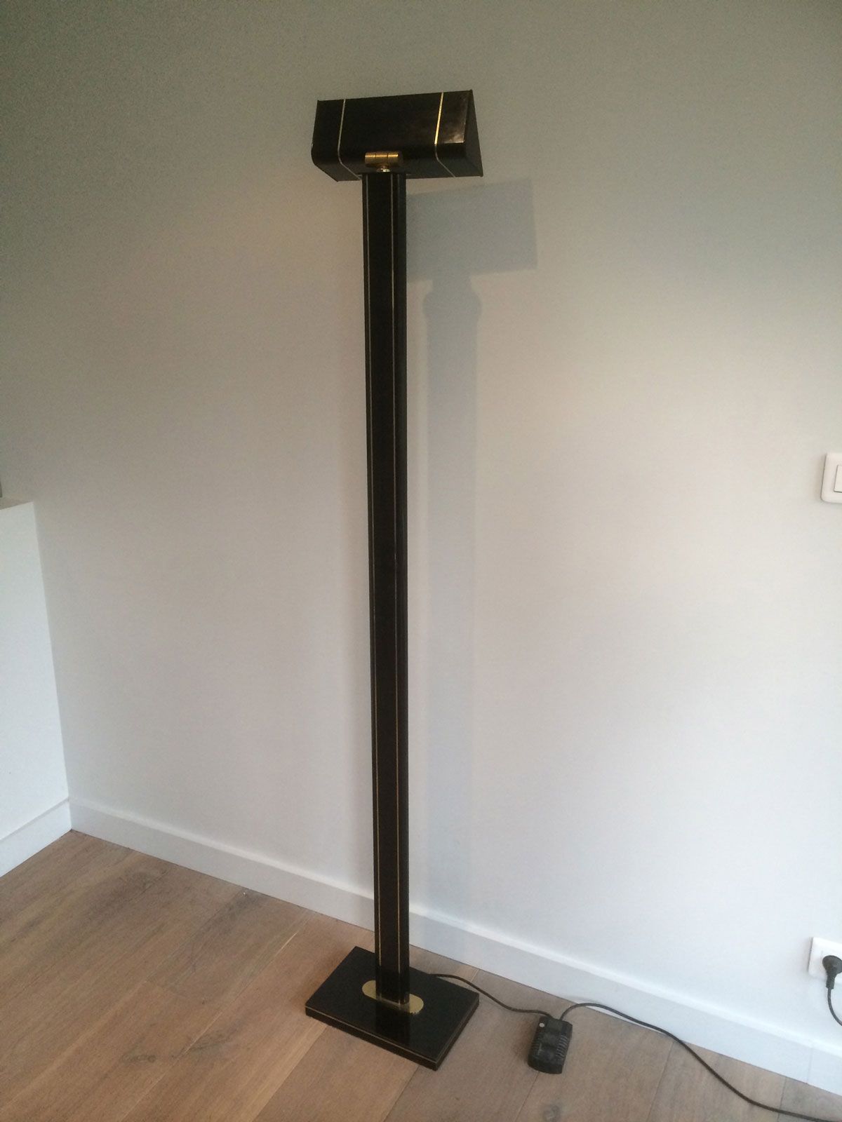 Black lacquered and brass floor lamp