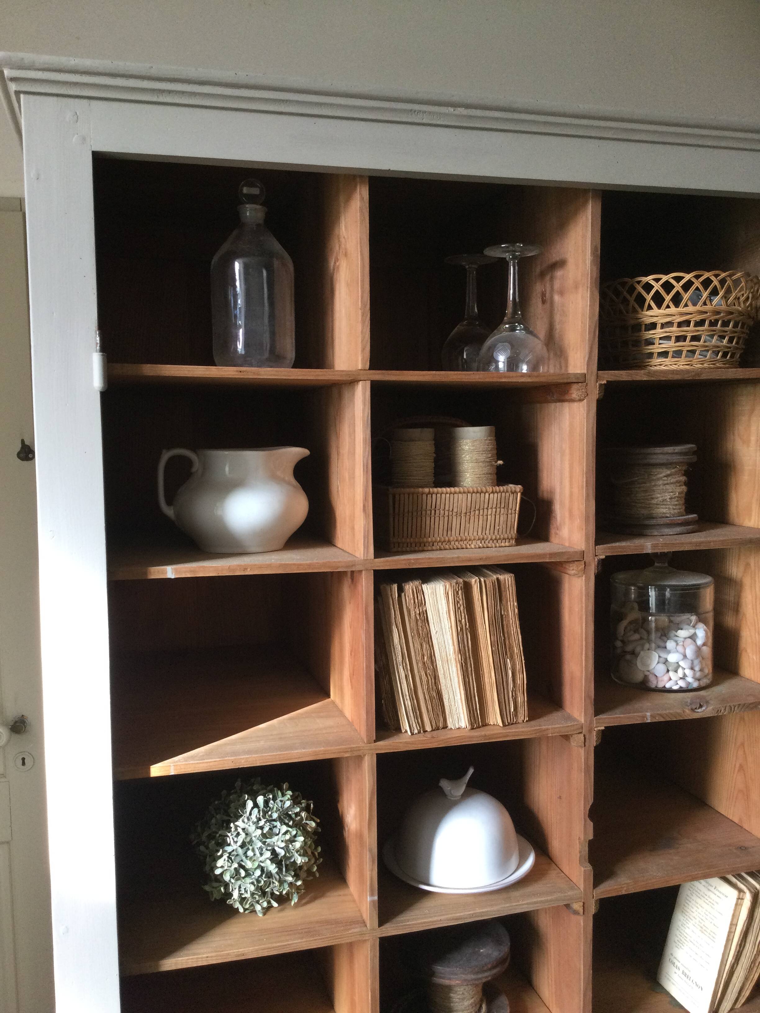 Antique Parisian wardrobe with interior compartments.