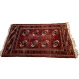 Red wool carpet, geometric pattern.