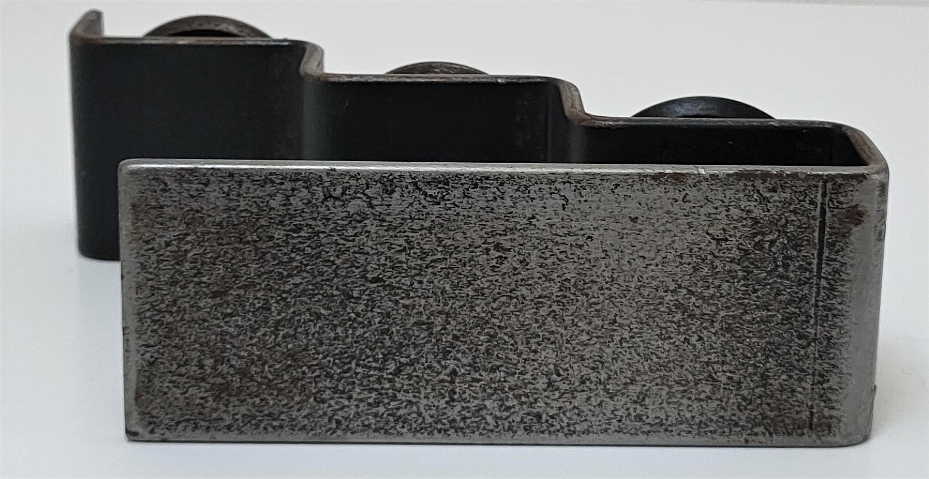 Sculptural candle holder patinated steel design 80s