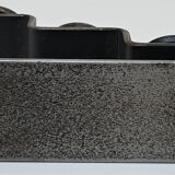 Sculptural candle holder patinated steel design 80s