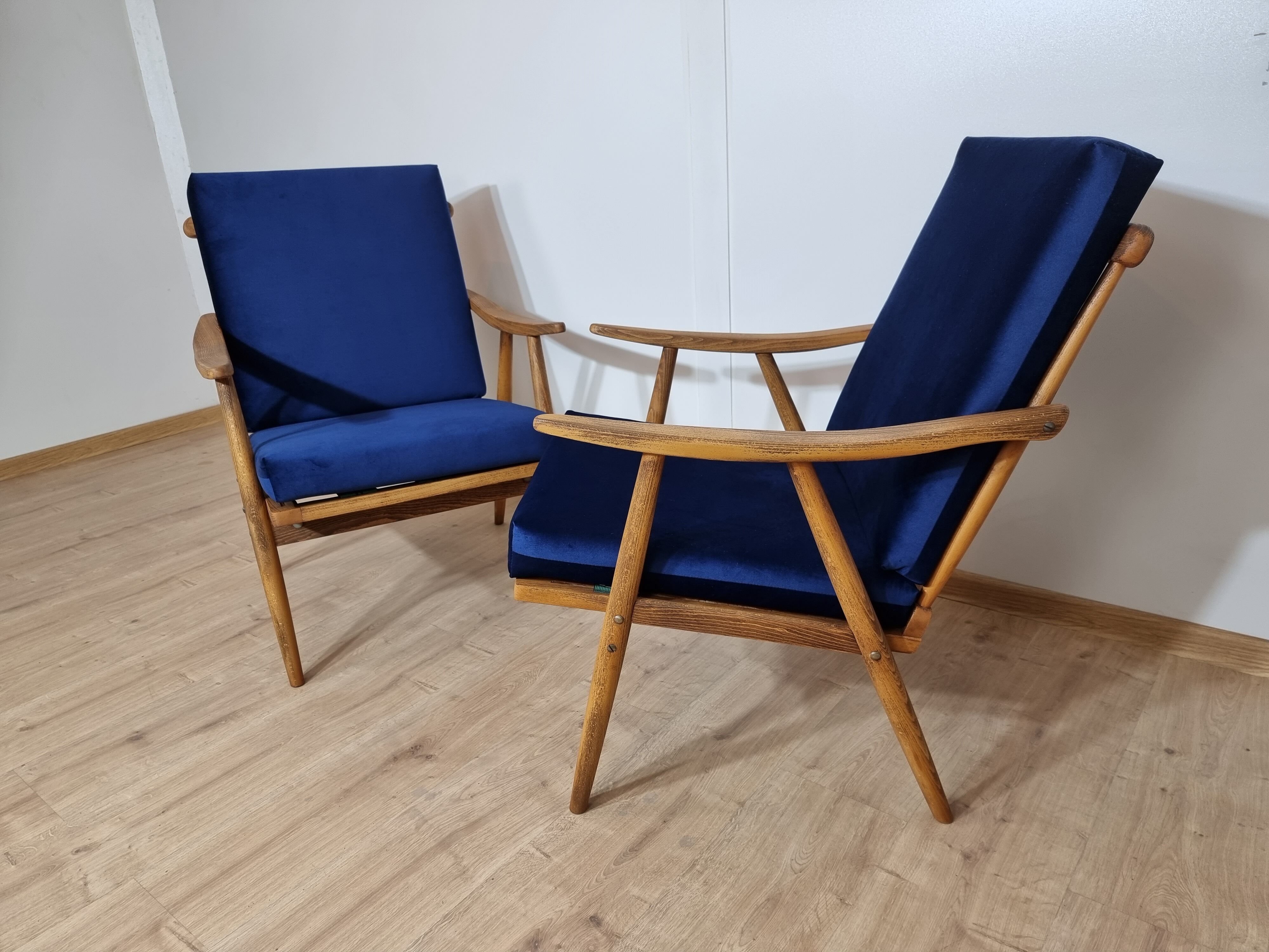 Boomerang" model armchairs by Ton
