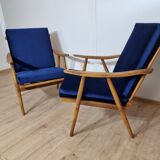 Boomerang" model armchairs by Ton