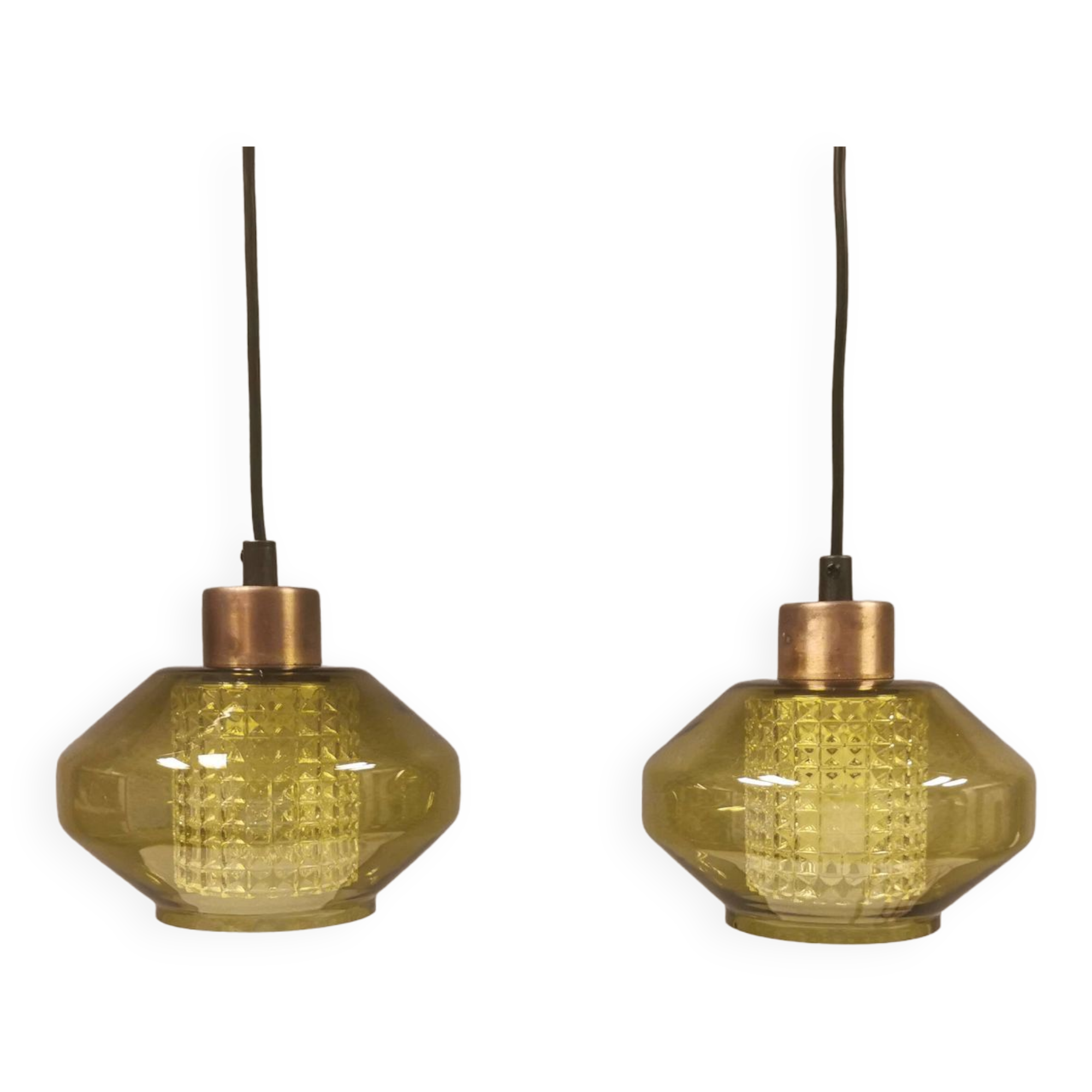 Hanging lamp with an outer shade of olive green glass and an inner shade of clear, crystal glass.