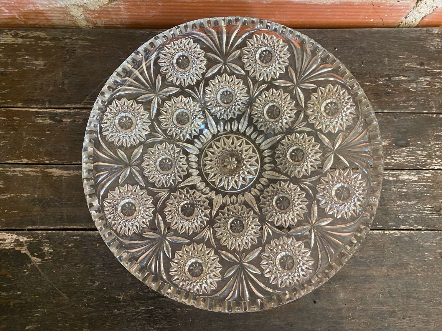 Cut glass fruit bowl with carved star decoration.