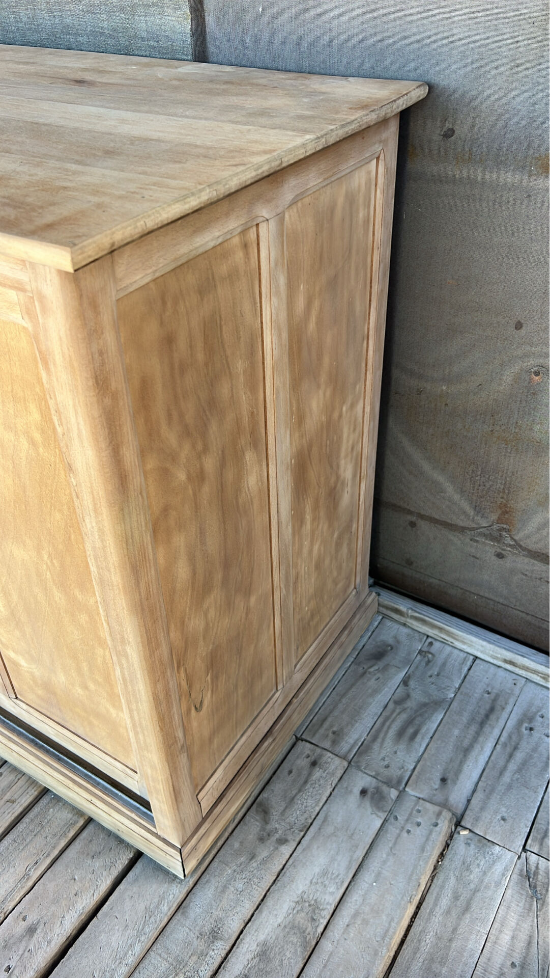 Old counter with sliding doors in raw wood