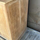 Old counter with sliding doors in raw wood