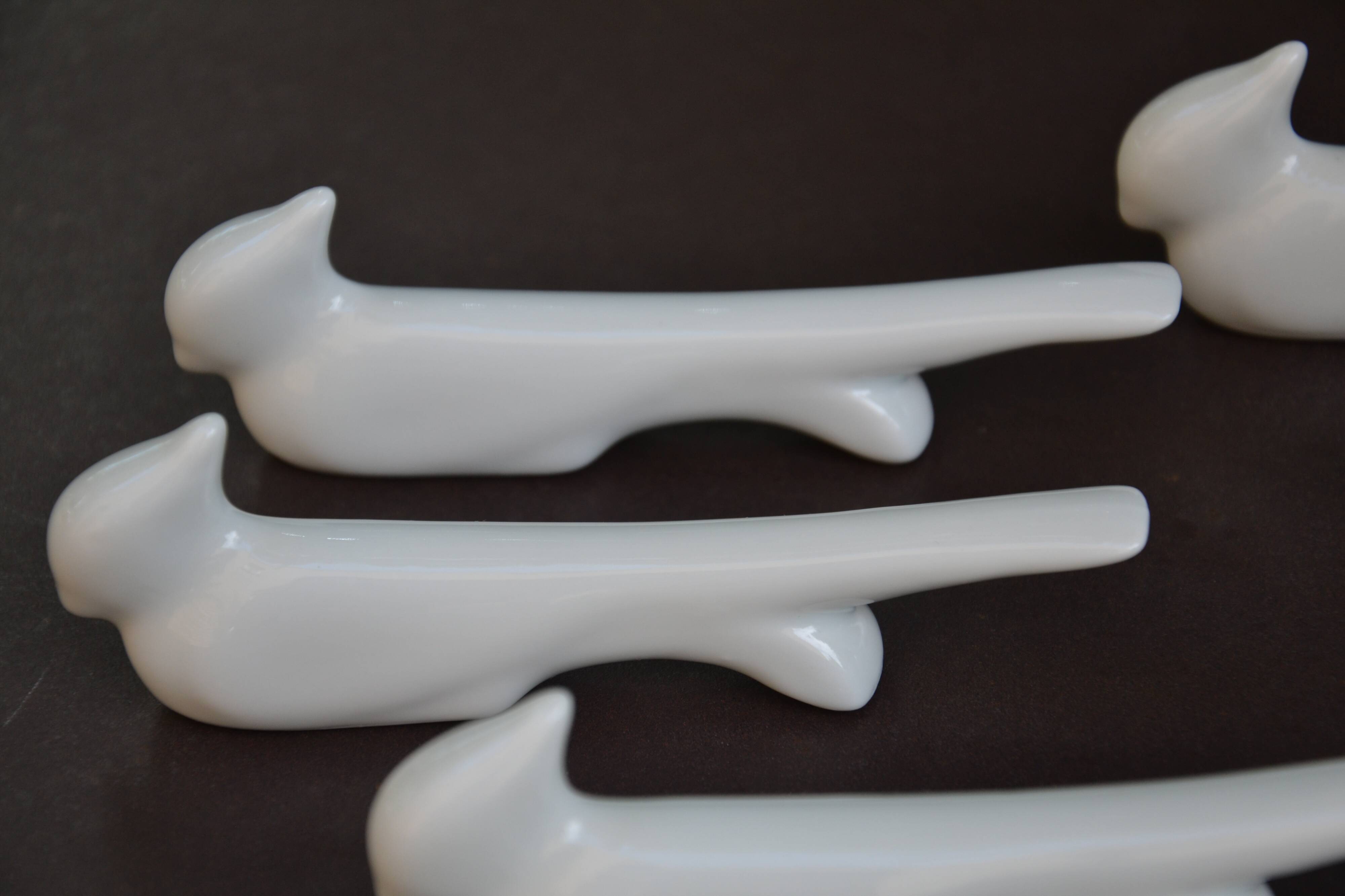 10 ceramic "bird" knife rests