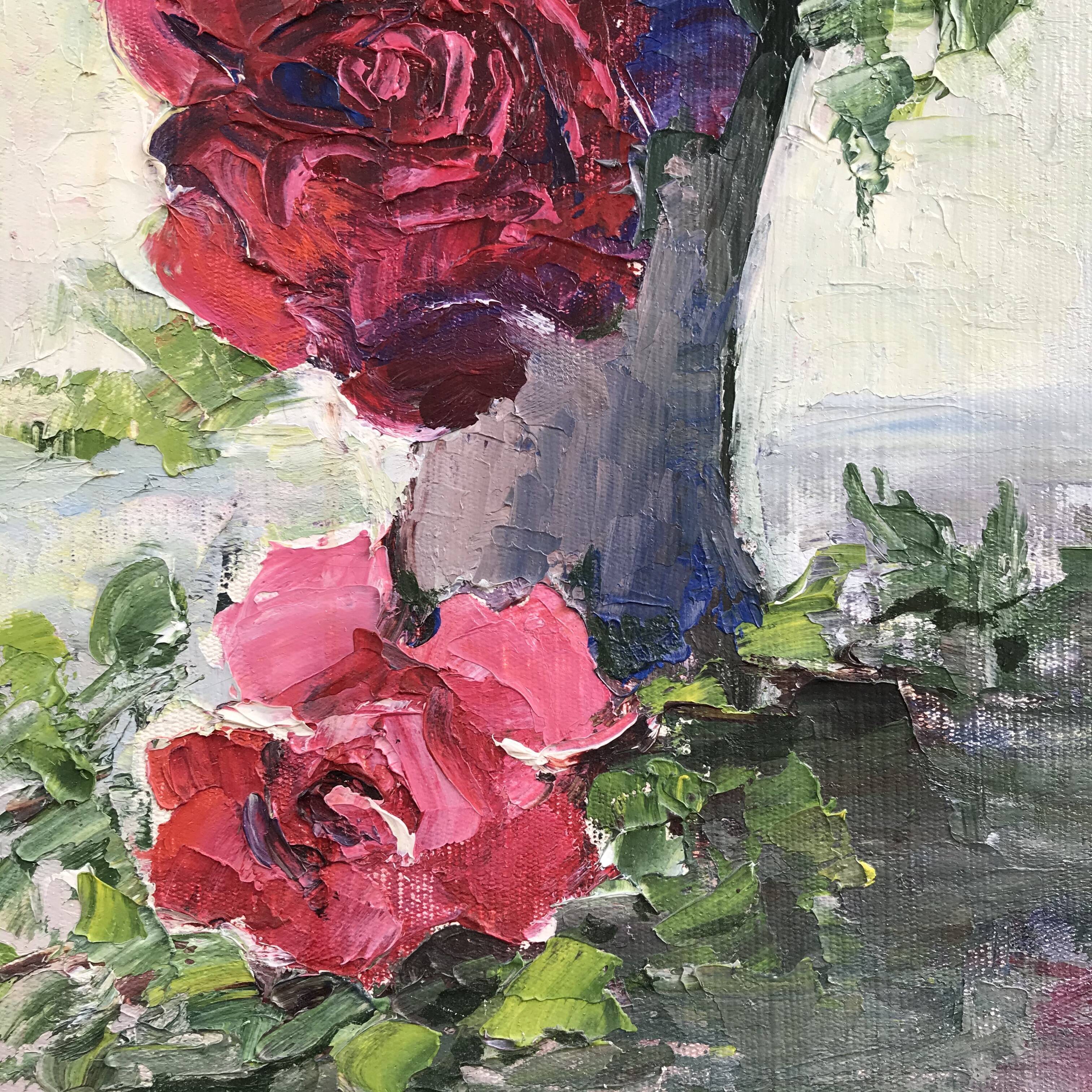 Table bouquet of red roses