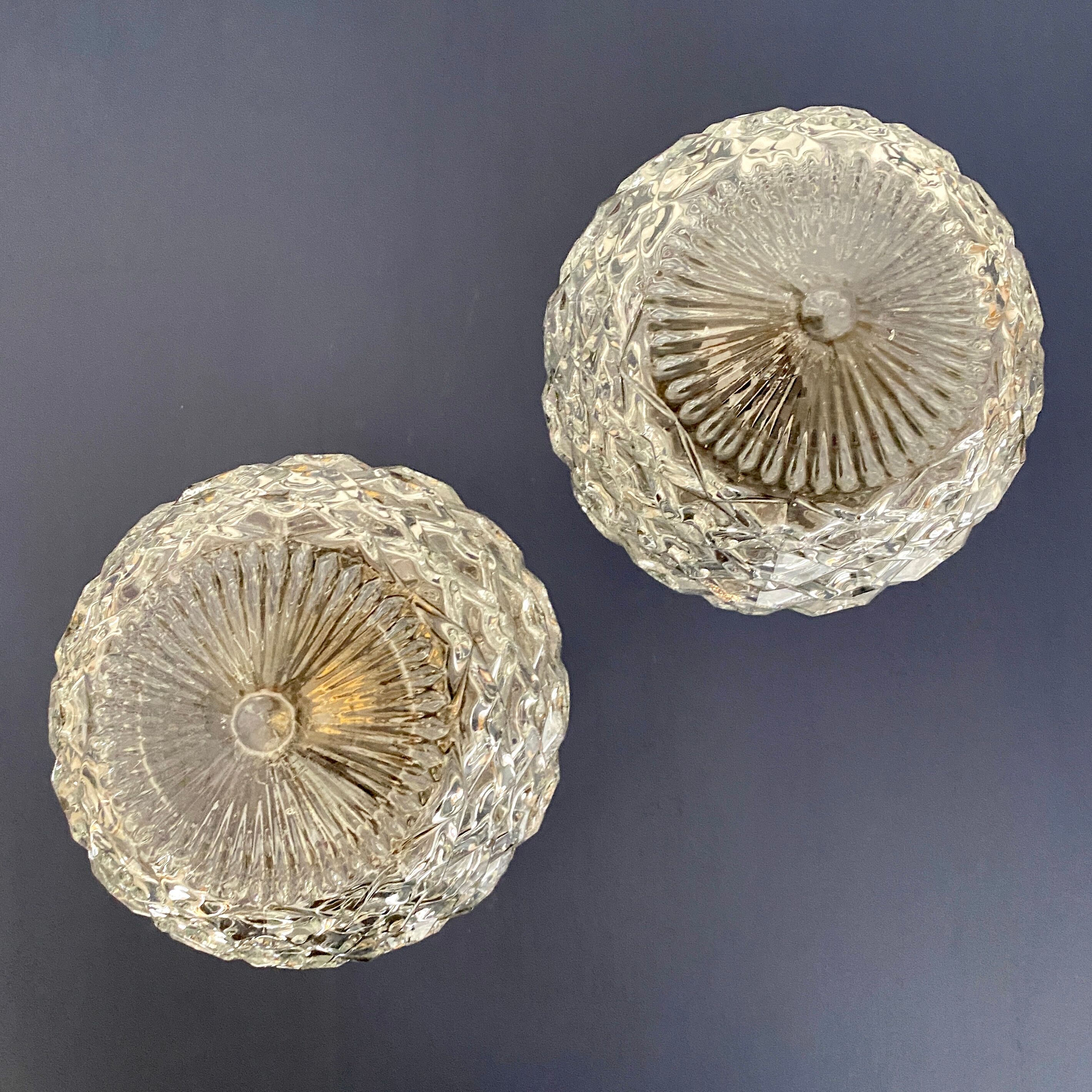 Pair of vintage wall lamps in molded glass and thermoplastic