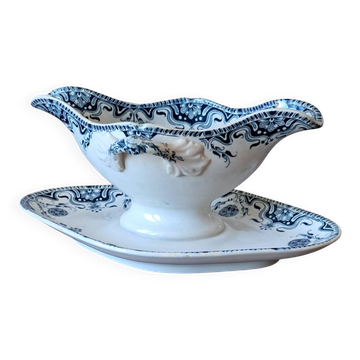 Starred sauceboat from Badonviller. Ironstone.