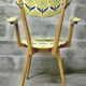 Blonde wooden chair in Scandinavian style from the 1960s.