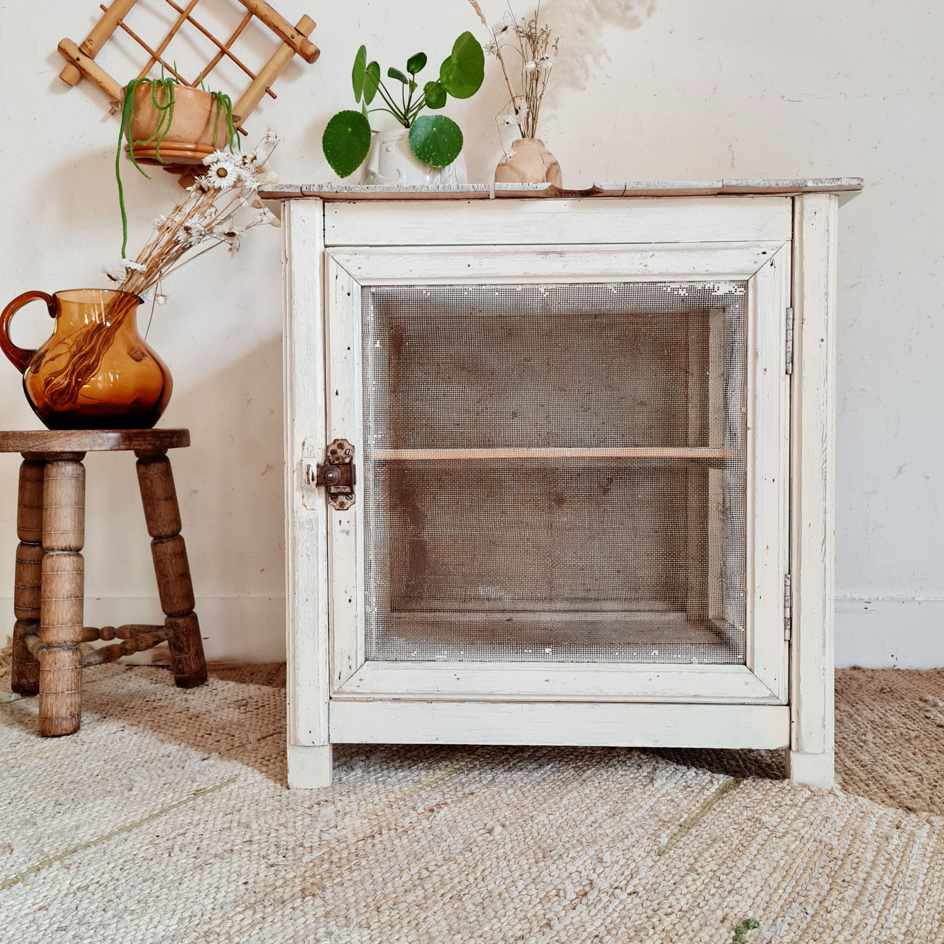Wooden pantry and white mesh